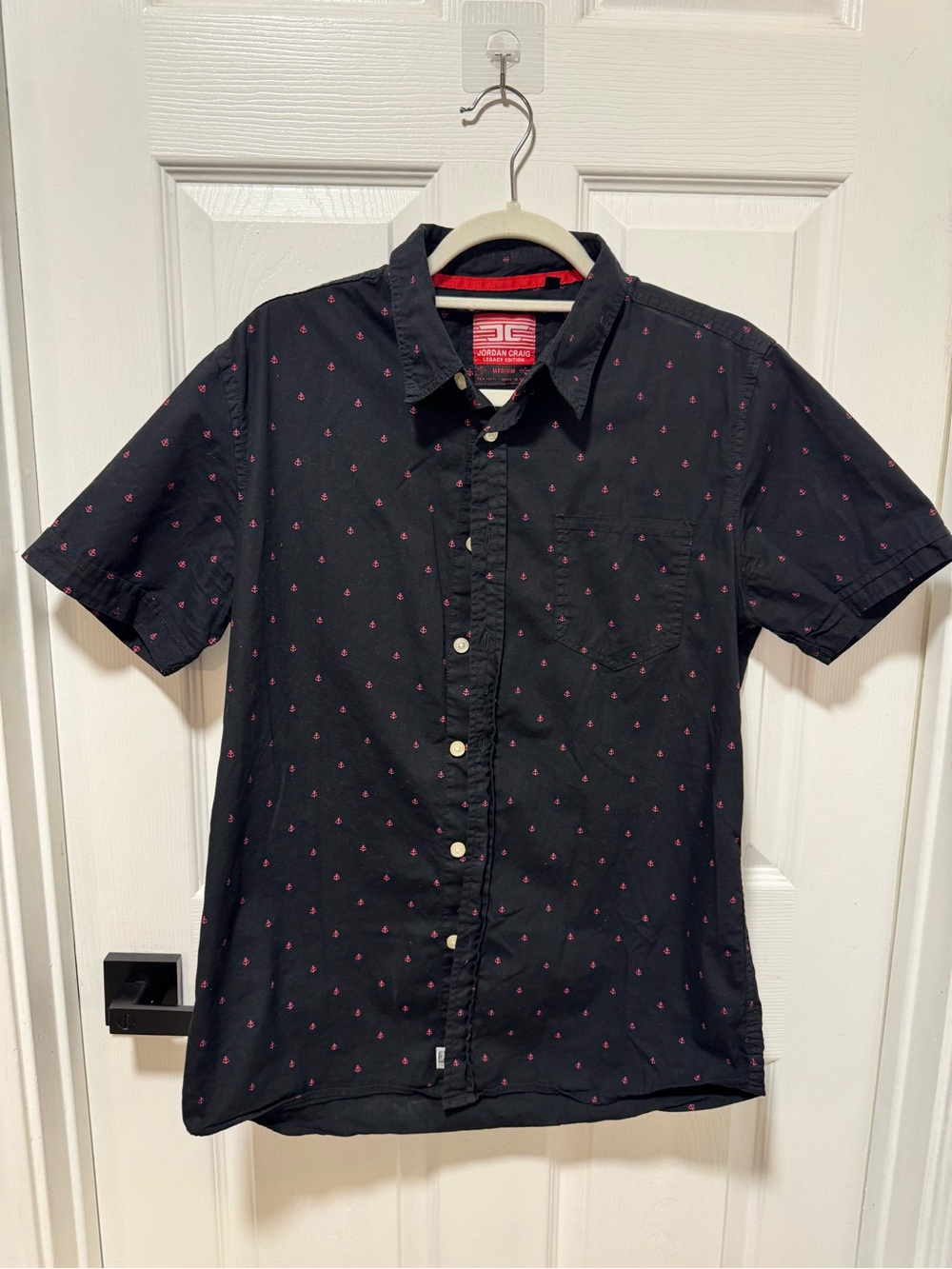 Black button-up shirt with small red anchors size medium